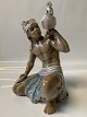 Dahl Jensen 
orientalsk 
figur, sudaner 
med kakadue.
Dekorationsnummer: 
 1305.
2. ...