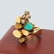 Anette Kræn; 
Ring of 14k 
gold with an 
amazonite and 
diamonds, total 
0,20 ct. Ring 
size 54. ...