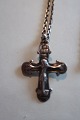 Necklace made of silwer with a beautiful and unusual crossClosed back as it was made from the ...