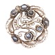 Georg Jensen 
Moonlight 
Blossom broche 
159 i 
sterlingsølv 
prydet med blå 
månesten
D: 4,8cm