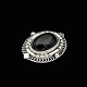 Georg Jensen. Broche i sterling sølv med onyx #419.Tegnet af Georg Jensen 1866 - ...