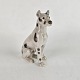 Figur i 
porcelæn med 
motiv af en 
siddende Gran 
Danois hund med 
sorte pletter.
Formgiver 
Svend ...