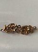 14 Karat guld 
broche med 
blomster
Stemplet: KS. 
585
Længde 4,0 cm.
Flot og ...