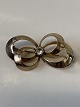 8 Karat guld, 
broche med klar 
sten
Stemplet: HS 
HS
Længde 3,6 cm.
Højde 1,9 cm.
Flot ...