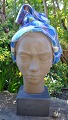Hedegaard, 
Johannes (1915 
- 1999) 
Danmark: Buste. 
Margrethe. 
Keramik med 
glasur. 
Stemplet ...