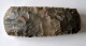 Dansk stenalder 
økse i flint. 
L.: 18,5 cm. 
Fundsted: 
Hundslund 
Sogn. 