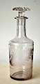 Karaffel "Fine 
Champagne", ca. 
1900. England. 
Med slbet motiv 
af egeblad med 
agern. H.: 19 
cm. 