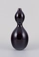 Nils Thorsson 
for Royal 
Copenhagen.
Unique 
stoneware vase, 
double 
gourd-shaped.
Aubergine ...