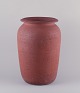 Kähler, large 
floor vase of 
unglazed red 
clay.
Mid 20th 
century.
Signed HAK, 
Denmark.
Made at ...