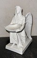 Figur i bisquit 
af Dåbens 
Engel. Udført 
af Bertel 
Thorvaldsen 
(1770-1844). 
Fremstillet hos 
Bing ...