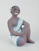 Mari Simmulson 
for Upsala 
Ekeby.
Figur af 
orientalsk 
kvinde. 
Glaseret ...