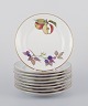 Royal 
Worcester, 
England. 
Et sæt på ni 
Evesham 
porcelænstallerkener 
dekoreret med 
frugter og ...