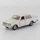 Hvid Volvo 144 
legetøjsbil i 
lakeret metal 
med gummi hjul. 
Modelbilens 
døre, bagklap 
og ...