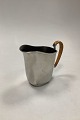 Just Andersen 
Kande med bast 
i Støbt Tin, 
No. 2500
Brugt, men i 
fin stand
Måler H 13,5 
cm / ...