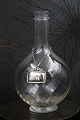 Georg Jensen 
Gognac skilt i 
sterling sølv. 
Stemplet. 
3,8x3,8cm. 
