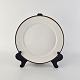 Frokosttallerken 
i porcelæn fra 
stellet Brun 
Domino
Nr 14923
Producent 
Royal ...