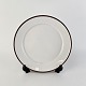 Sidetallerken i 
porcelæn fra 
stellet Brun 
Domino
Nr 14922
Producent 
Royal ...