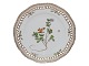 Royal 
Copenhagen 
Flora Danica, 
frokosttallerken 
med gennembrudt 
kant.
Dekorationsnummer 
...