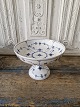 Royal 
Copenhagen 
Musselmalet 
riflet opsats 
No. 22-23, 1. 
sortering
Højde 14 cm. 
Diameter 20 ...