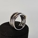 Snoet 
fingerring i 
sølv og med 
guld
Med kasse
Producent 
Pandora
Stemplet 925
Vægt 6,92 g