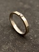 14 karat 
hvidguld ring 
med diamant 
størrelse 55 
stemplet 585 
emne nr. 615318