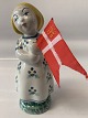 Aluminia figure 
Little Sister 
faience 
Children's Aid 
Day figures. 
1941
Height. 12.5 
cm.
The ...