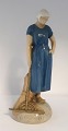Bing & Grøndahl. Porcelænsfigur. Pige med rive. Model 2050. Højde 27 cm. (2 
sortering).