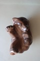 Royal Copenhagen (RC) FigurineBear cub, lieing/sleeping made of porcelainDesign: Knud Kyhn, ...