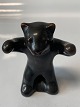 Brown bear standing with arms up L. Hjort.
Bornholm pottery.