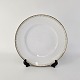 Tallerken fra 
stellet Luna
Nr. 25
Hvidt porcelæn 
dekoreret med 
guld motiv og 
...