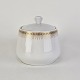 Sukkerskål med 
låg i hvidt 
porcelæn med 
dekoration i 
guld fra 
stellet Trend 
1220
Producent: ...