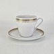 Kop med 
underkop i 
hvidt porcelæn 
med dekoration 
i guld fra 
stellet Trend 
1220
Producent: ...