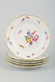 Meissen, et sæt 
på fem 
tallerkner i 
porcelæn.
Håndmalet ...