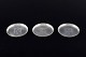 Just Andersen, 
tre 
flaskebakker, 
model 2620.
Tre små runde 
flaskebakker i 
tin, graveret 
med ...