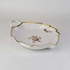 Bladformet 
kagefad i 
porcelæn fra 
stellet Brun 
rose. Nr. 
688/9209
Producent 
Royal ...