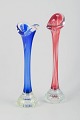 Swedish glass 
artist
Two vases in 
colored and 
clear glass.
Organic forms 
with optical 
air ...