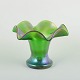 Bohemia, 
attributed to 
Loetz. Vase. 
Ca. 1900.
Mouth-blown 
green glass 
vase with 
iridescent ...