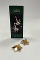 Georg Jensen 
Golden 
Christmas 
Stjernelysestager, 
2 stk. Design: 
Claus Bjerring. 
Forgyldt ...