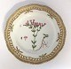 Royal 
Copenhagen, 
Flora Danica. 
Frokost 
tallerken med 
gennemskåret 
bort. Design 
#3554. Diameter 
...