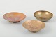 Tumulus Bronce, 
Denmark
Set of three 
bowls in 
patinated 
bronze. Two 
shallow footed 
bowls and ...