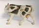 Bing & 
Grøndahl. 
Porcelænsfigur. 
Stående ko. 
Model 2161. 
Længde 22 cm. 
Højde 15,5 cm. 
(2 sortering)