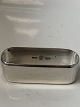Servietring 
Sterling sølv.
Størrelse: 1,9 
x ø 5,9 cm.