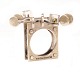 Bent Exner 
sterling sølv 
ring prydet med 
flammende arme 
og to plexiglas 
kvadrater
Bent Exner ...