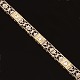 14kt hvidguld 
leddelt 
armlænke prydet 
med 
gennembrudte 
dekorationer og 
tre diamanter 
ca. 0,25ct ...