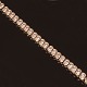 14kt hvidguld 
tennisarmbånd 
prydet med 62 
diamanter på 
hver ca. 0,05ct 
i alt ca. 3ct
L: 19,5cm. ...