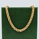 A long twisted 
necklace of 14 
kt. gold and 
white gold.
The chain can 
be opened.
L. 80 cm. W. 
...