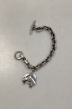 Aarre og Krogh 
Sterling Sølv 
Armlænke med 
hestesko 
vedhæng
Måler: 20 cm / 
7.87 inch 
Vægt: ...