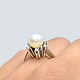Ole Lynggaard; 
Ring i 18 kt. 
hvidguld, med 
perle omkranset 
af diamanter. 
Omkring ring 
str. ...