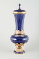 Meissen
Lidded 
porcelain vase, 
early 20th 
century.
Elegant lidded 
vase in deep 
cobalt blue ...