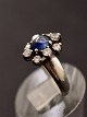 Sterling silver 
ring size 52 
with cabochon 
cut sapphire 
surrounded by 
clear stones 
item no. 623552